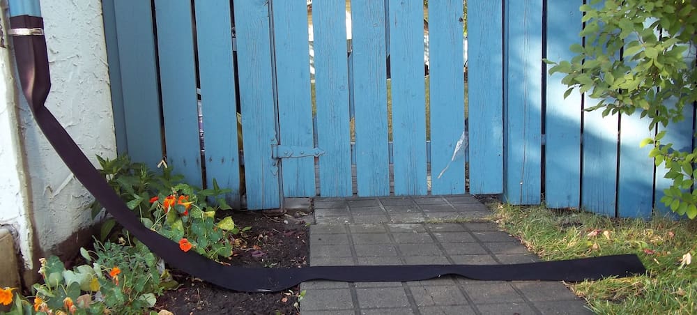 Flexible Downspout going across sidewalk